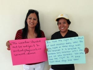 Jordan.Filipina domestic worker participants in a combatting trafficking in persons training June 2014, holding signs with their rights under Jordanian law2.fr.crop