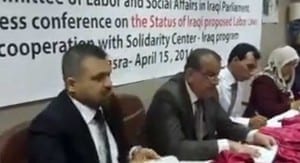Labor Committee Vice President Salih Al Asady (second from left) speaks at a press conference held by Iraqi unions