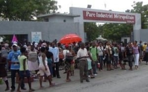 Workers outside SONAPI Industrial Park, Port-au-Prince, rallying for decent pay on October 8, 2012. Credit: Susan Washington.