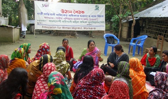 Bangladeshi women gather in a courtyard meeting