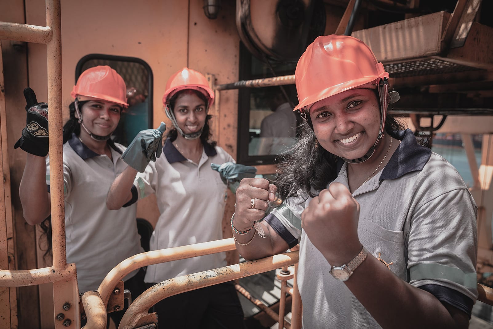 https://www.solidaritycenter.org/wp-content/uploads/2020/04/Sri-Lanka.Women-crane-operators.Sean-Stephen-SC.2018.Larger-size.jpg