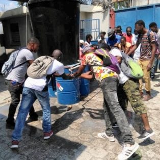 Back at Work, Haiti Garment Workers Risk COVID-19