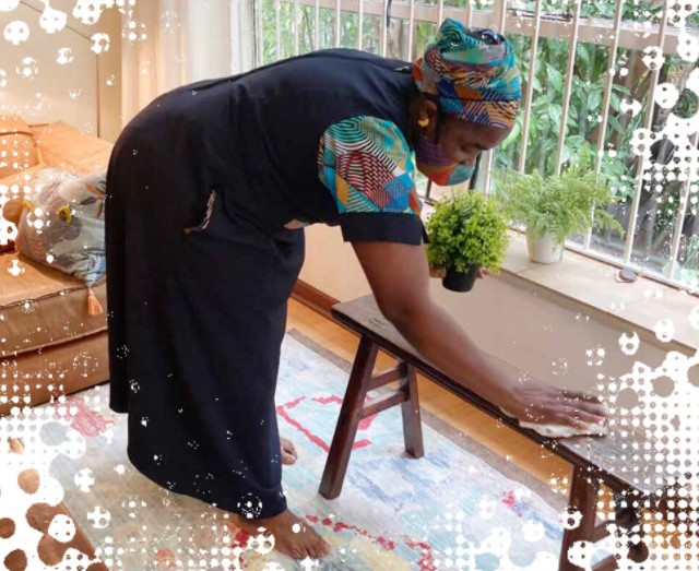 Former domestic worker and IZWI employee Nomuhle Ndlovu, featured on the cover of a new survey focused on domestic worker rights in South Africa, has joined the fight for domestic worker dignity on the job. Credit Amy Tekie / IZWI