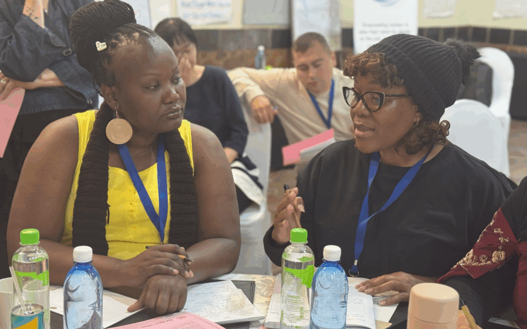 Two Global Labor Leadership Initiative (GLLI) participants at a 2025 Solidarity Center convening that joined 19 union leaders and worker rights defenders from 10 African, Asian and European countries to share strategies on how unions can strengthen democracy through the exercise and advancement of labor rights